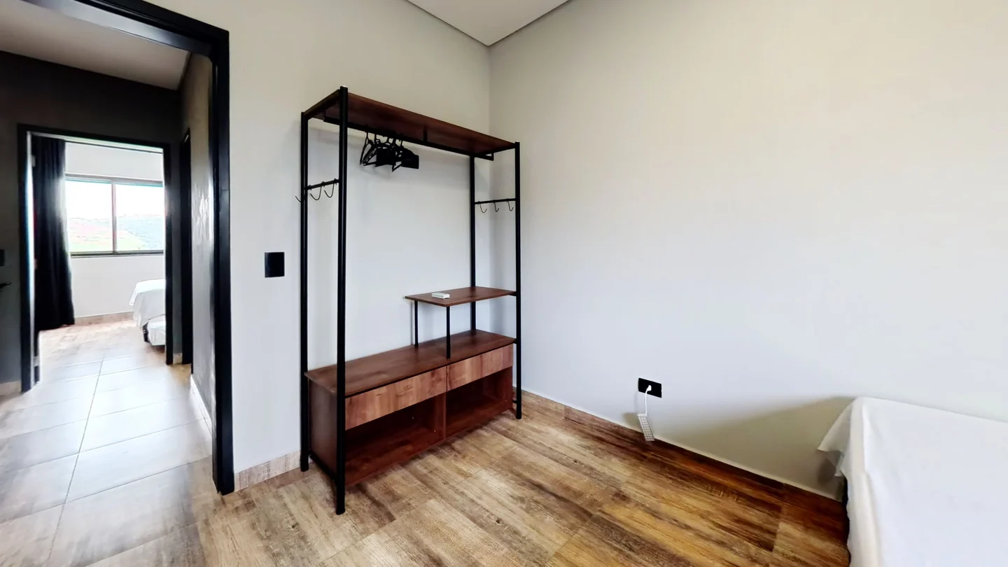Quarto aconchegante da hospedagem