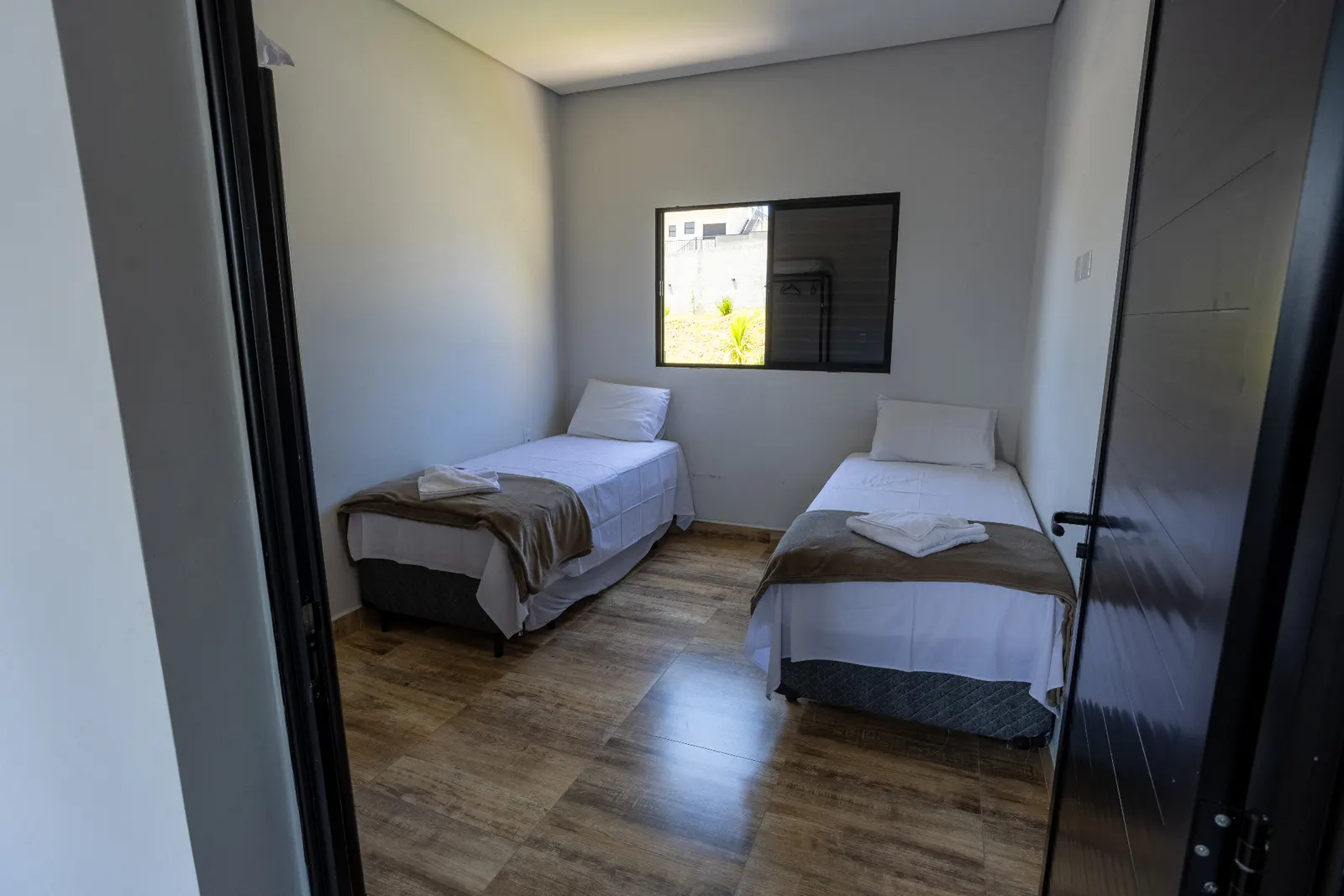 Quarto com camas de solteiro